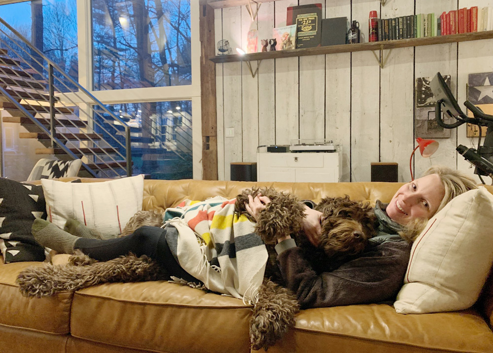 This image has an empty alt attribute; its file name is Midwest-Labradoodle-Laddie-Laying-With-His-Mommy.jpg